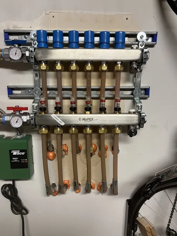 Plumber performing Water Heater Repair at a residential property in Bow